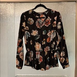 Black floral peplum top with lace up front